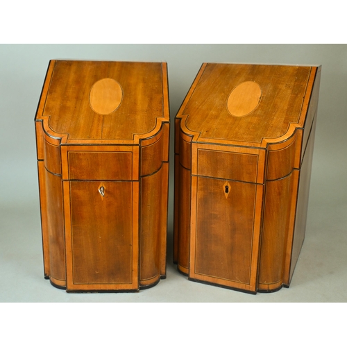 725 - A pair of Georgian cross-banded and inlaid satinwood knife boxes, of slope top serpentine form, the ... 