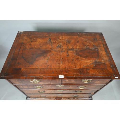 731 - An 18th century feather-banded walnut chest of two short over three long graduated drawers, with bra... 