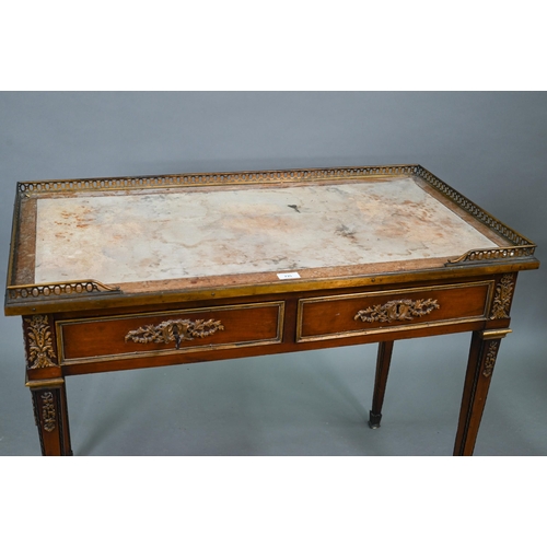 735 - A Louis XVI style ormolu mounted kingwood writing table, 19th century, the pierced 3/4 gallery top w... 