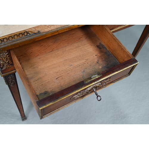 735 - A Louis XVI style ormolu mounted kingwood writing table, 19th century, the pierced 3/4 gallery top w... 