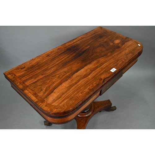736 - A Regency burr yew cross banded rosewood card table, the fold over top with rounded corners enclosin... 
