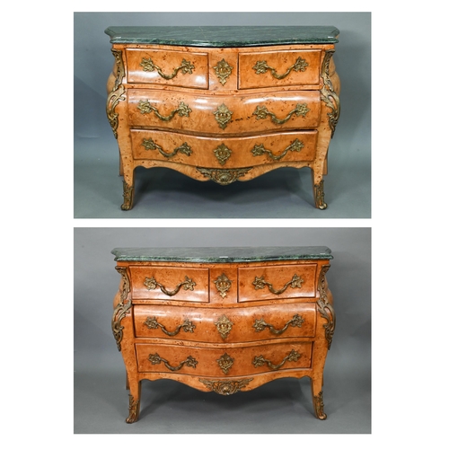 737 - A pair of continental green marble top maple and gilt metal mounted bombe commodes, two short over t... 