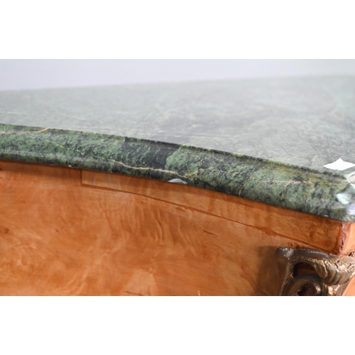 737 - A pair of continental green marble top maple and gilt metal mounted bombe commodes, two short over t... 