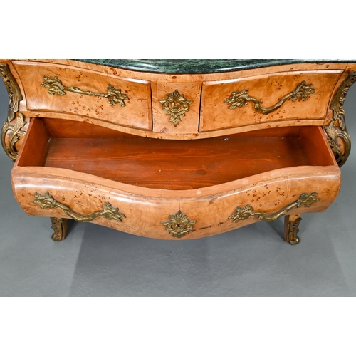 737 - A pair of continental green marble top maple and gilt metal mounted bombe commodes, two short over t... 
