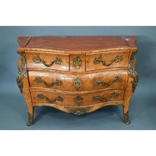 737 - A pair of continental green marble top maple and gilt metal mounted bombe commodes, two short over t... 