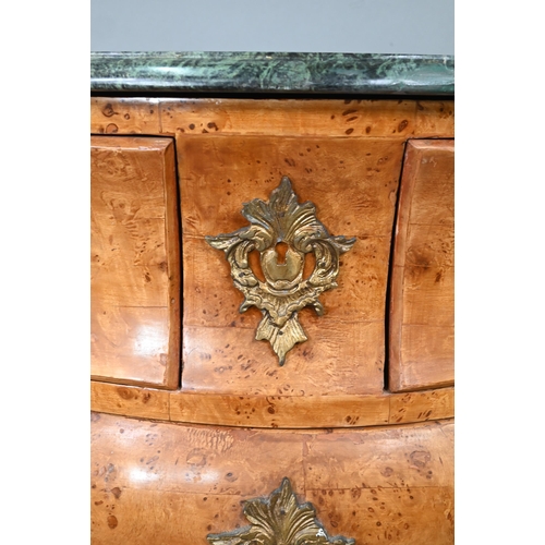 737 - A pair of continental green marble top maple and gilt metal mounted bombe commodes, two short over t... 