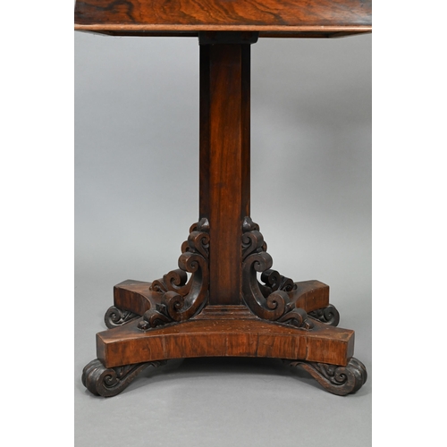 738 - A Regency rosewood sarcophagus form teapoy, the interior with four lidded tea boxes, centred by two ... 