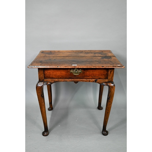 743 - A late 17th/18th century oak single drawer side table, raised on hip moulded cabriole legs, 80 cm x ... 