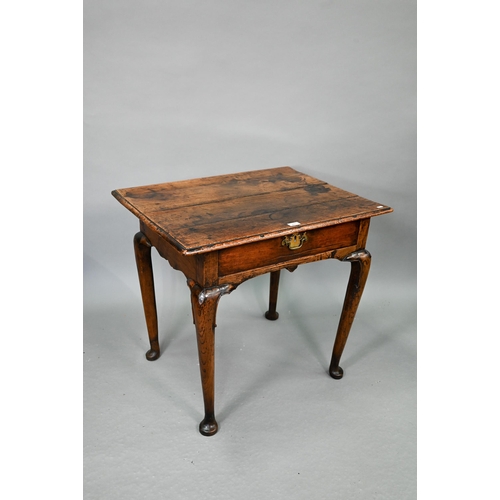 743 - A late 17th/18th century oak single drawer side table, raised on hip moulded cabriole legs, 80 cm x ... 