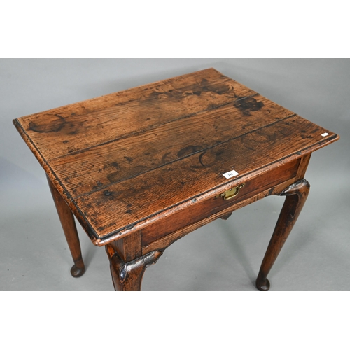 743 - A late 17th/18th century oak single drawer side table, raised on hip moulded cabriole legs, 80 cm x ... 
