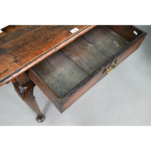 743 - A late 17th/18th century oak single drawer side table, raised on hip moulded cabriole legs, 80 cm x ... 
