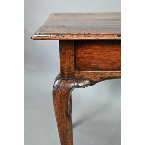 743 - A late 17th/18th century oak single drawer side table, raised on hip moulded cabriole legs, 80 cm x ... 