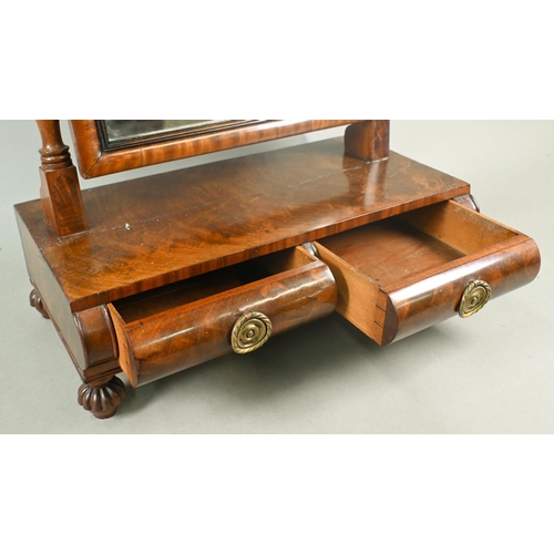 744 - A Regency mahogany platform toilet mirror, with two short drawers and raised on turned gadrooned fee... 