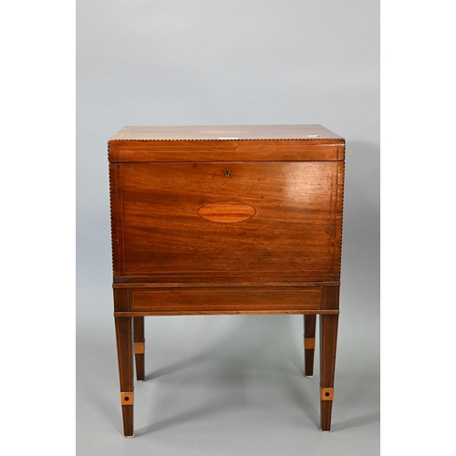 749 - A Victorian inlaid mahogany cellaret, bearing makers plate for Nolan & Sons, Dublin, the interio... 