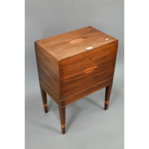 749 - A Victorian inlaid mahogany cellaret, bearing makers plate for Nolan & Sons, Dublin, the interio... 