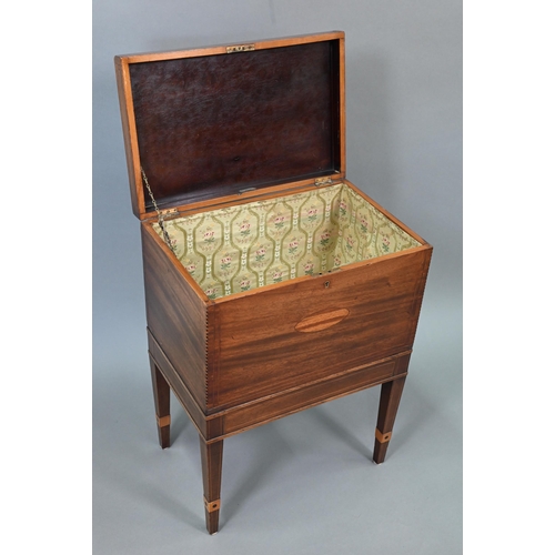 749 - A Victorian inlaid mahogany cellaret, bearing makers plate for Nolan & Sons, Dublin, the interio... 