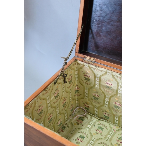 749 - A Victorian inlaid mahogany cellaret, bearing makers plate for Nolan & Sons, Dublin, the interio... 