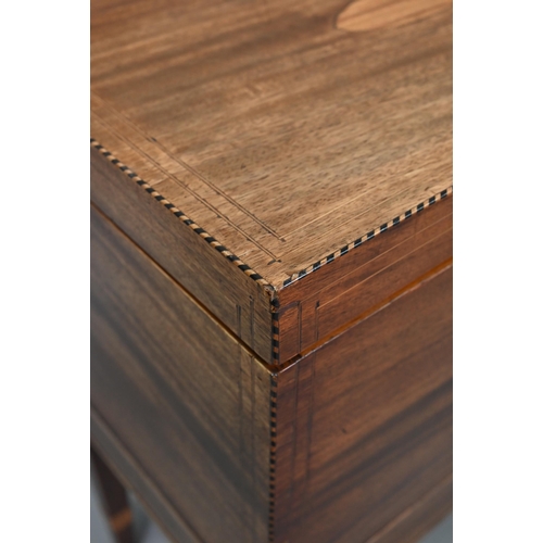 749 - A Victorian inlaid mahogany cellaret, bearing makers plate for Nolan & Sons, Dublin, the interio... 