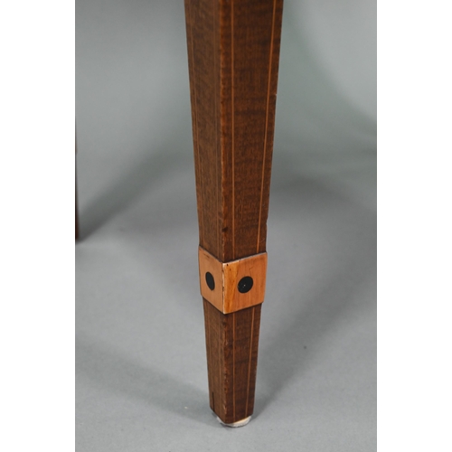 749 - A Victorian inlaid mahogany cellaret, bearing makers plate for Nolan & Sons, Dublin, the interio... 