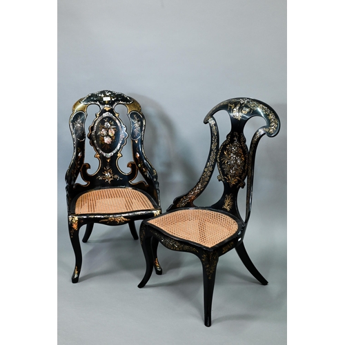 750 - Two Victorian black lacquered gilt and mother-of-pearl inlaid papier mache chairs, with caned seats,... 