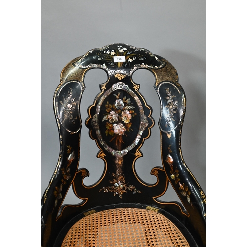 750 - Two Victorian black lacquered gilt and mother-of-pearl inlaid papier mache chairs, with caned seats,... 