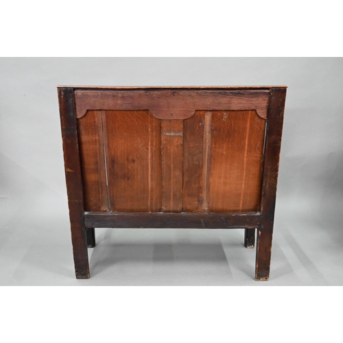 753 - A diminutive 18th century and later composed oak cottage settle, the twin panelled high back over sh... 