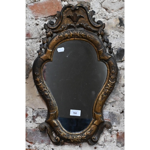 760 - An antique carved giltwood framed cartel form mirror, 52 cm x 32 cm h