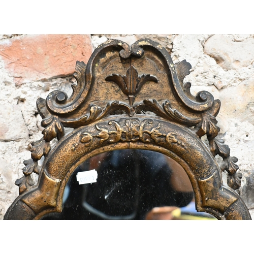 760 - An antique carved giltwood framed cartel form mirror, 52 cm x 32 cm h