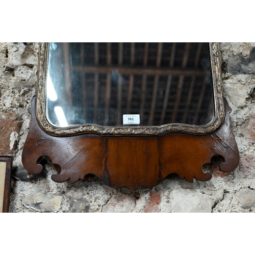 761 - A 19th century yew fet cut mirror, with gilt slip, the crest centred by a ho-ho bird device, 94 h cm... 