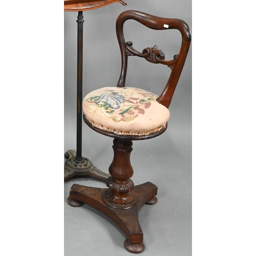 762 - A Victorian Rosewood revolving cello/music chair, raised on a tri-form platform base