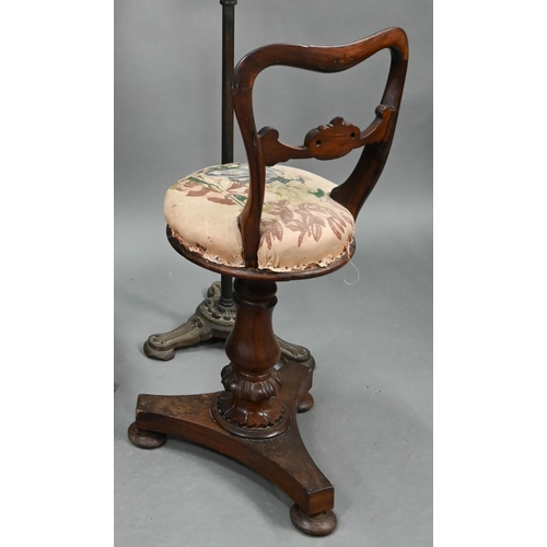 762 - A Victorian Rosewood revolving cello/music chair, raised on a tri-form platform base