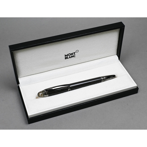 900 - A cased Mont Blanc Starwalker full carbon fineliner pen, with box and paperwork to/w a Mont Blanc Me... 