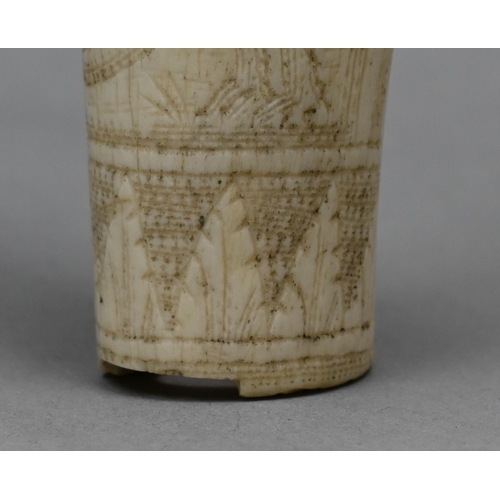 904 - An antique bone scrimshaw beaker with iron ring hanger, incised with a lion fighting a crocodile, 11... 