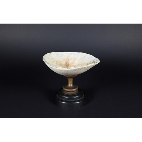 905 - An unusual vintage small comport, the bowl a cranial cap, on brass stem and composite foot, 8.5 cm h... 