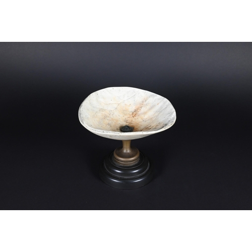 905 - An unusual vintage small comport, the bowl a cranial cap, on brass stem and composite foot, 8.5 cm h... 