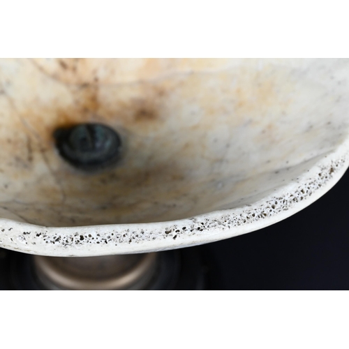 905 - An unusual vintage small comport, the bowl a cranial cap, on brass stem and composite foot, 8.5 cm h... 