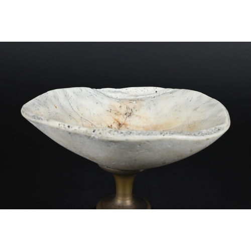 905 - An unusual vintage small comport, the bowl a cranial cap, on brass stem and composite foot, 8.5 cm h... 