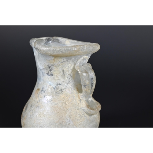 906 - Two Mediterranean antiquity glass jugs, 12/8 cm to/w a similar, later jar (3)