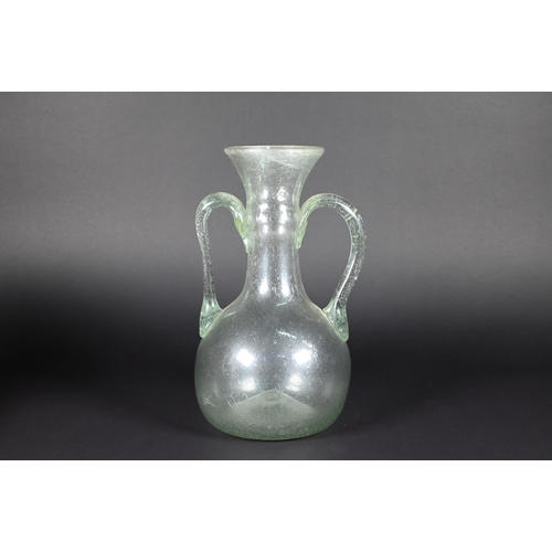 906 - Two Mediterranean antiquity glass jugs, 12/8 cm to/w a similar, later jar (3)