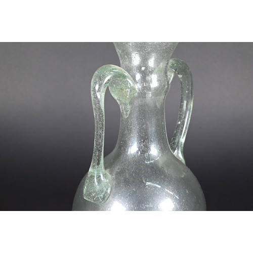 906 - Two Mediterranean antiquity glass jugs, 12/8 cm to/w a similar, later jar (3)