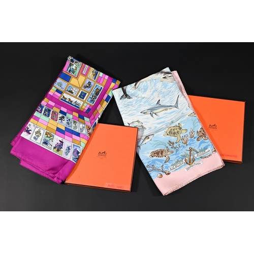 926 - Hermés - Two boxed silk scarves featuring sea creatures and purple stamps, rolled edges, 87 x... 