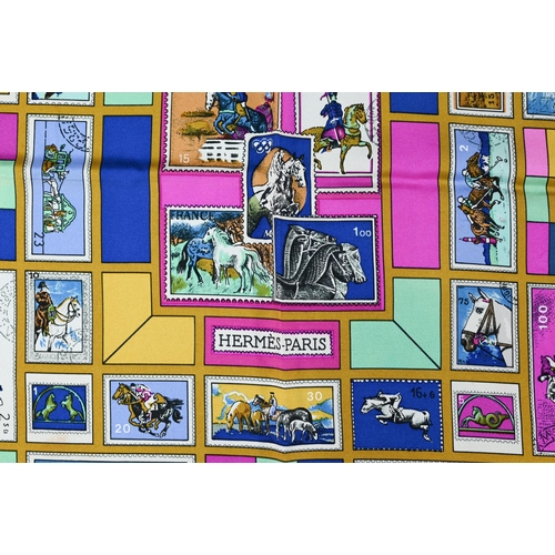 926 - Hermés - Two boxed silk scarves featuring sea creatures and purple stamps, rolled edges, 87 x... 