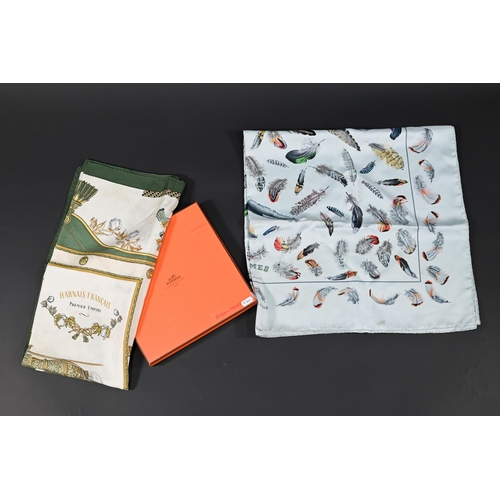 927 - Hermés - Two silk scarves featuring green horses and feathers, rolled edges, one box, 87 x 87 cm (2)... 