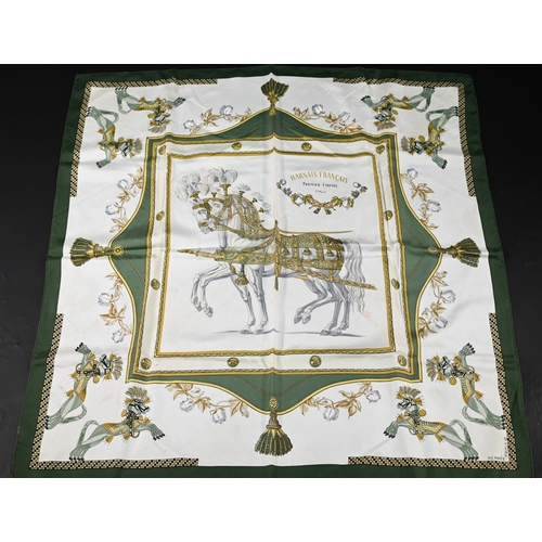 927 - Hermés - Two silk scarves featuring green horses and feathers, rolled edges, one box, 87 x 87 cm (2)... 