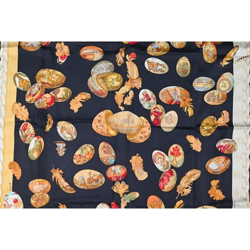 929 - Hermés - Two boxed silk scarves - red hawks and navy egg, rolled edges, 87 x 87 cm (2)Some di... 