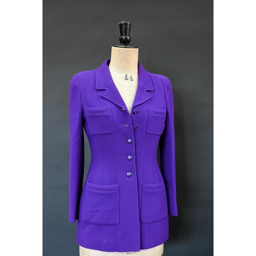 935 - Chanel Boutique - A long purple fitted wool single breasted jacket with double lapel collar and brea... 