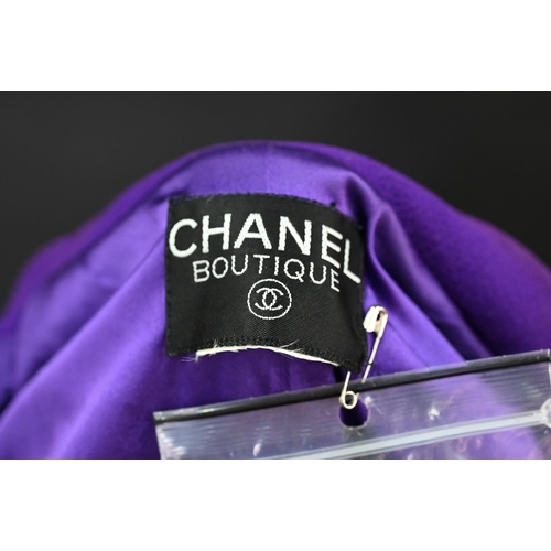 935 - Chanel Boutique - A long purple fitted wool single breasted jacket with double lapel collar and brea... 