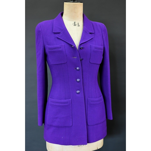 935 - Chanel Boutique - A long purple fitted wool single breasted jacket with double lapel collar and brea... 