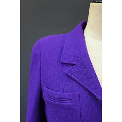 935 - Chanel Boutique - A long purple fitted wool single breasted jacket with double lapel collar and brea... 