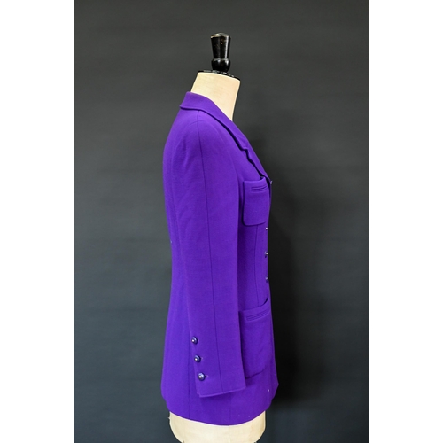 935 - Chanel Boutique - A long purple fitted wool single breasted jacket with double lapel collar and brea... 